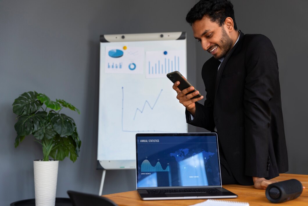 business-person-looking-finance-graphs_23-2150461354